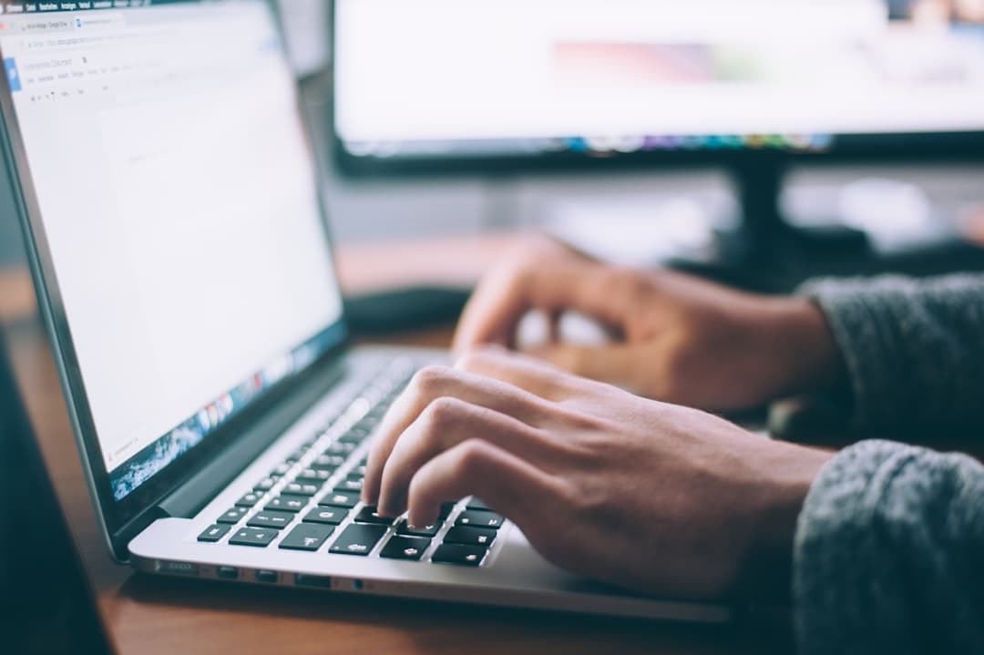 Person using a laptop with a chat assistant